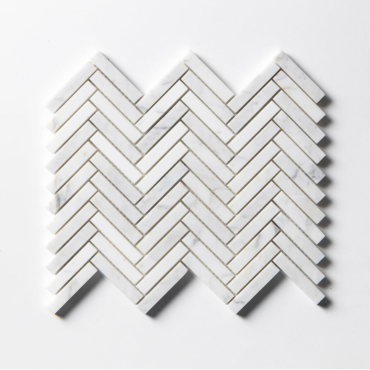 Calacatta Gold Honed Herringbone 5/8x3 Marble Mosaic — 10 7/16 × 12 13/16 × 3/8 in